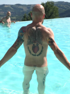 back in the infinity pool at Bellaugello gay guest house